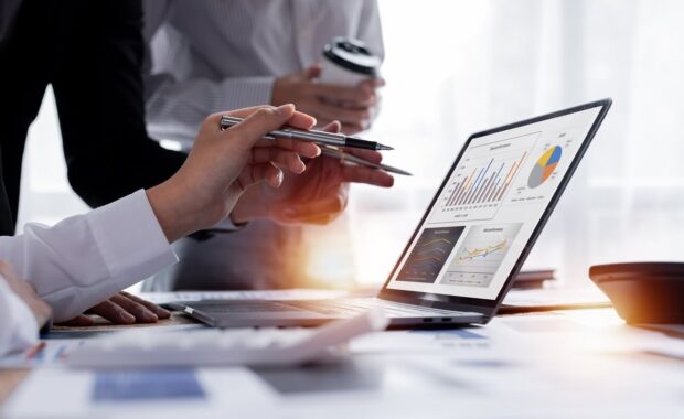 business team working at office with documents on his desk, doing planning analyzing the financial report