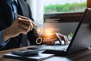 performance checklist, businessman using laptop doing online checklist survey