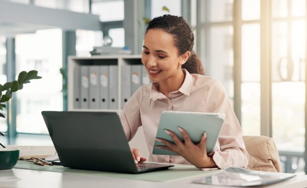 tablet or woman with laptop in office for financial record analysis, compliance verification or planning