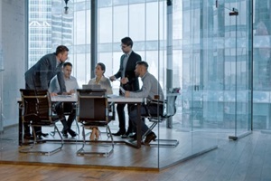 young business people discussing holding a presentation in modern office